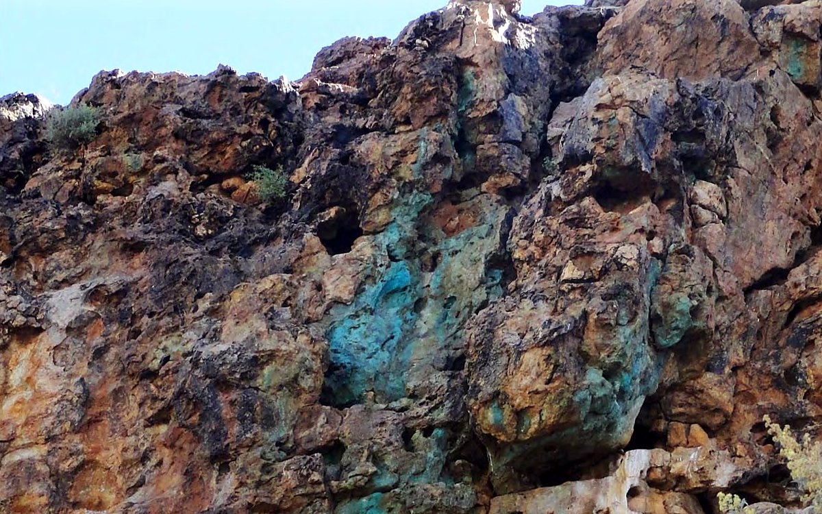 Copper-stained rock outcrop